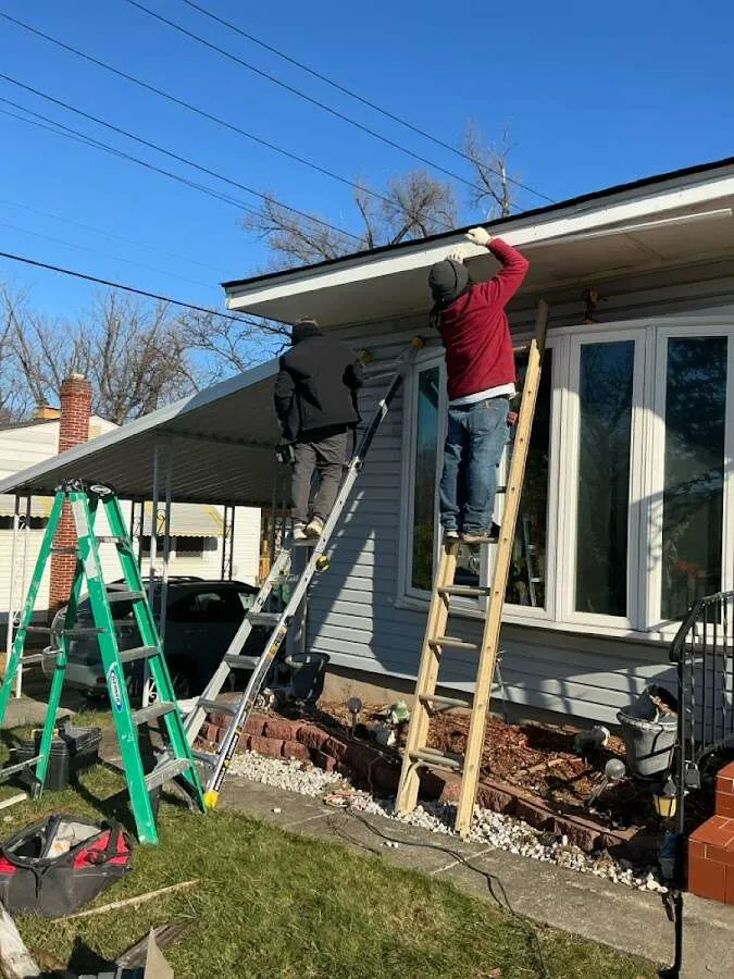 Restoration crew performing exterior repair in Lexington